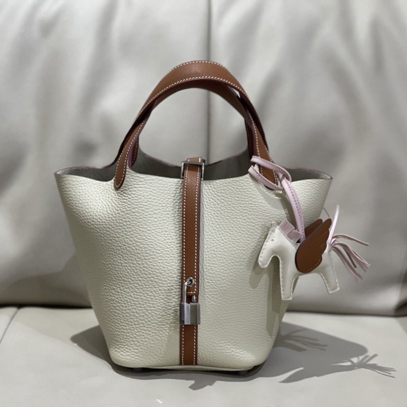 H**mes shopping bags